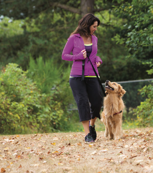 woman running with her dog